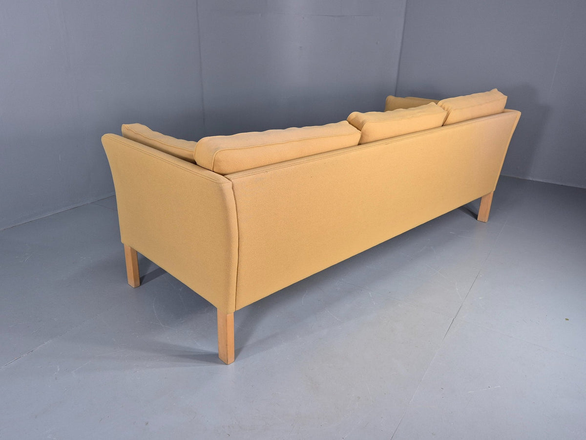 Yellow wool sofa leg wear note