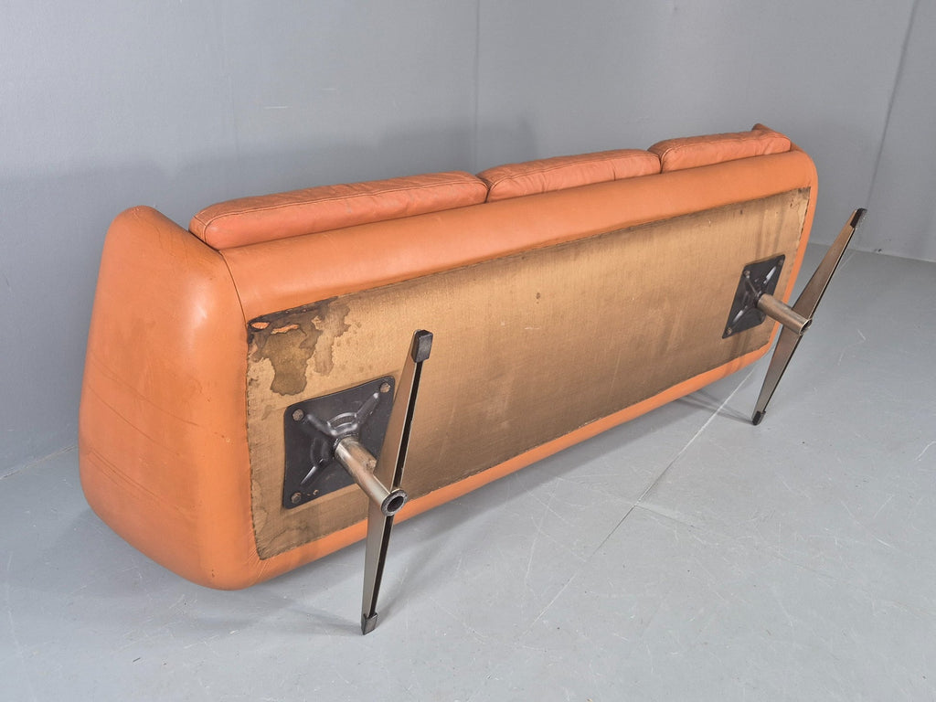 Tan leather sofa cushion shape retained