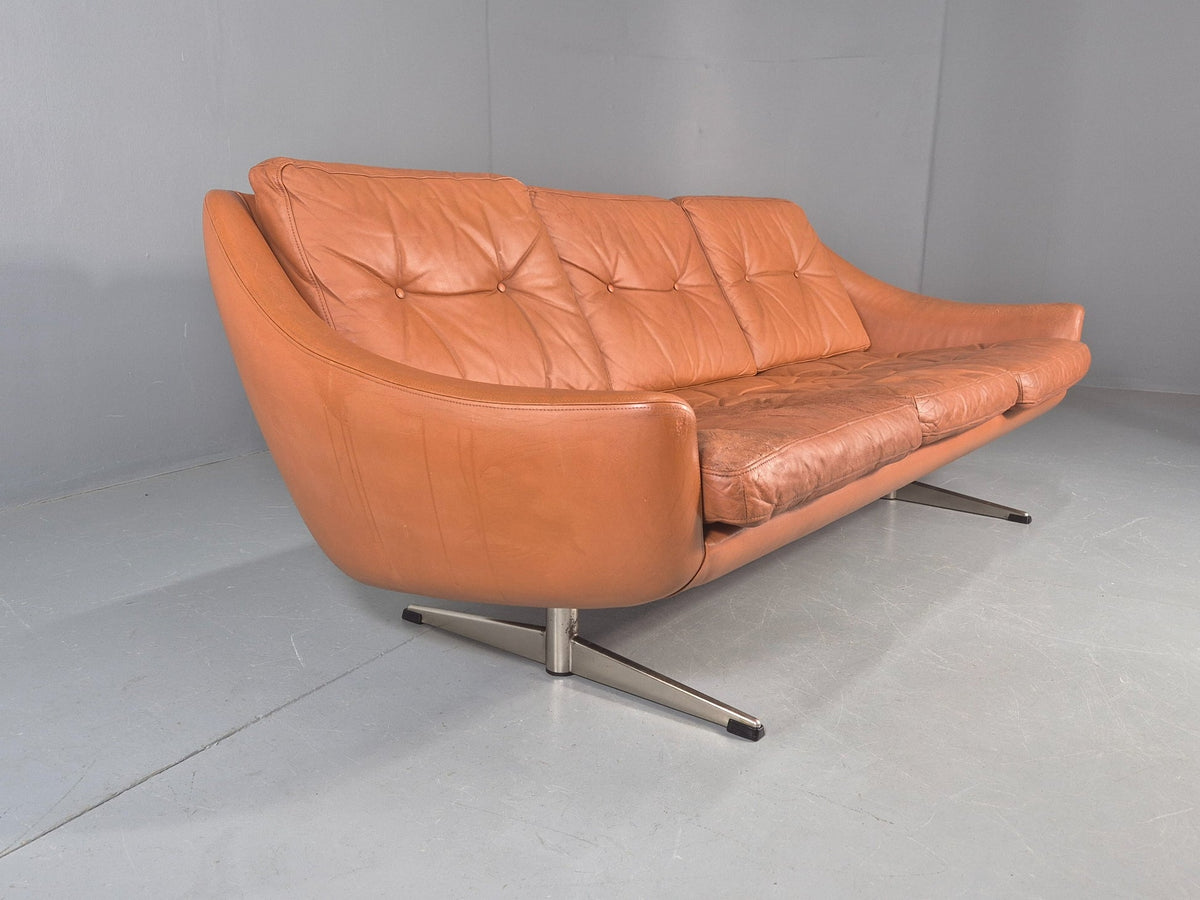 Tan leather sofa beech frame tapered leg detail