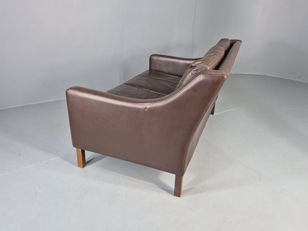 Brown leather sofa scale reference