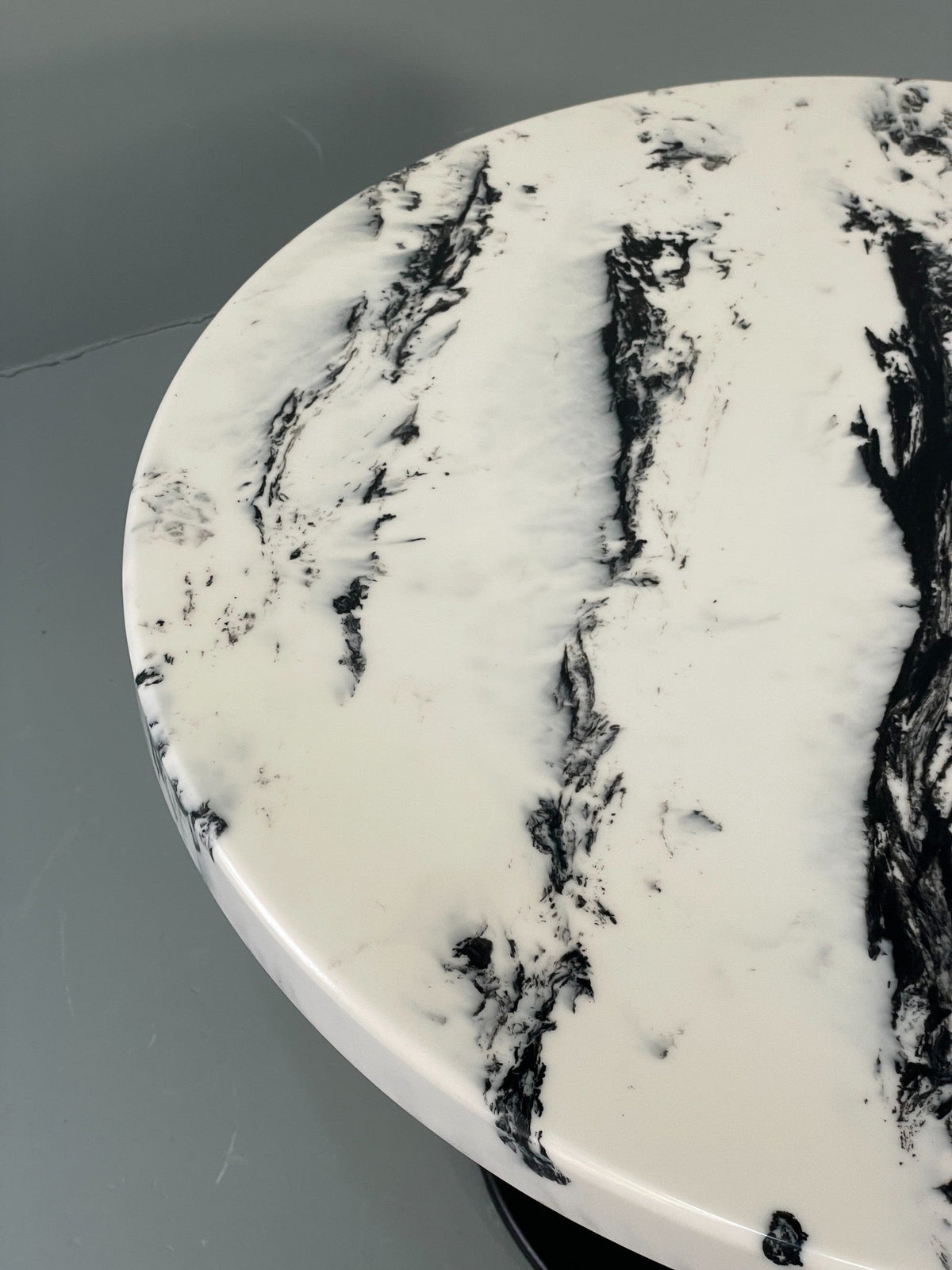 Faux marble side table adjustable feet detail