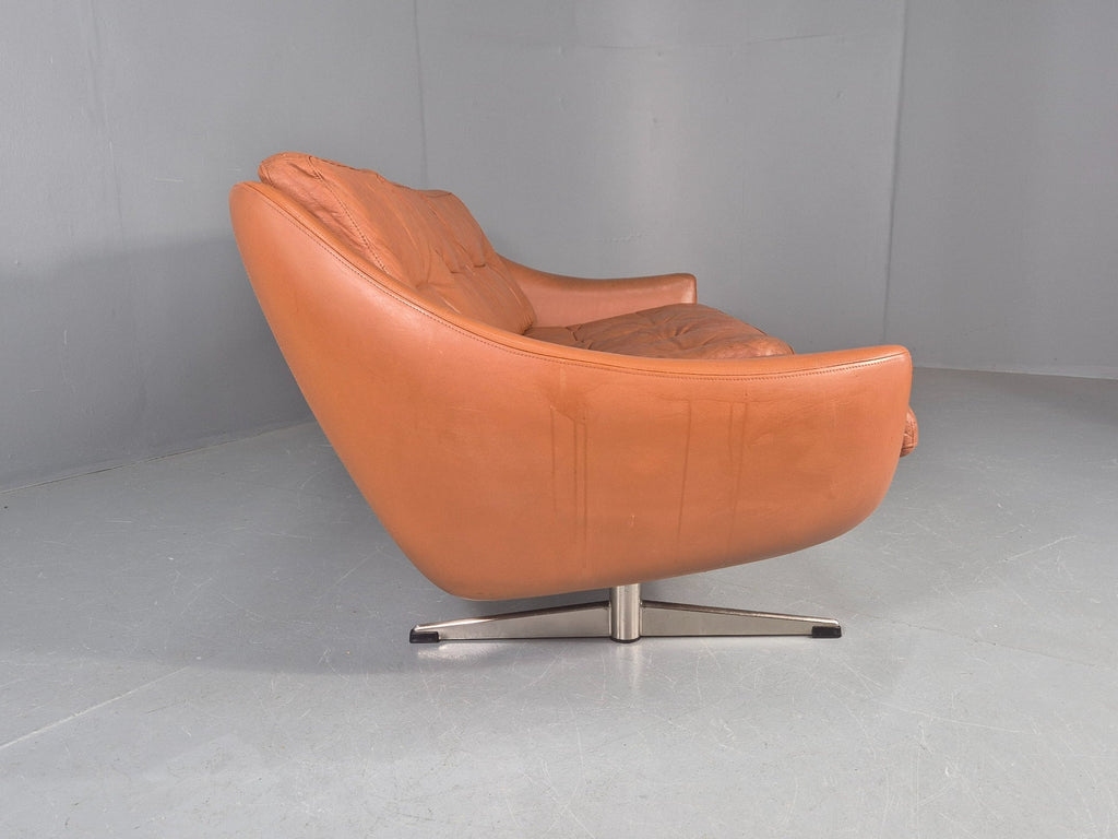 Tan leather sofa full length view