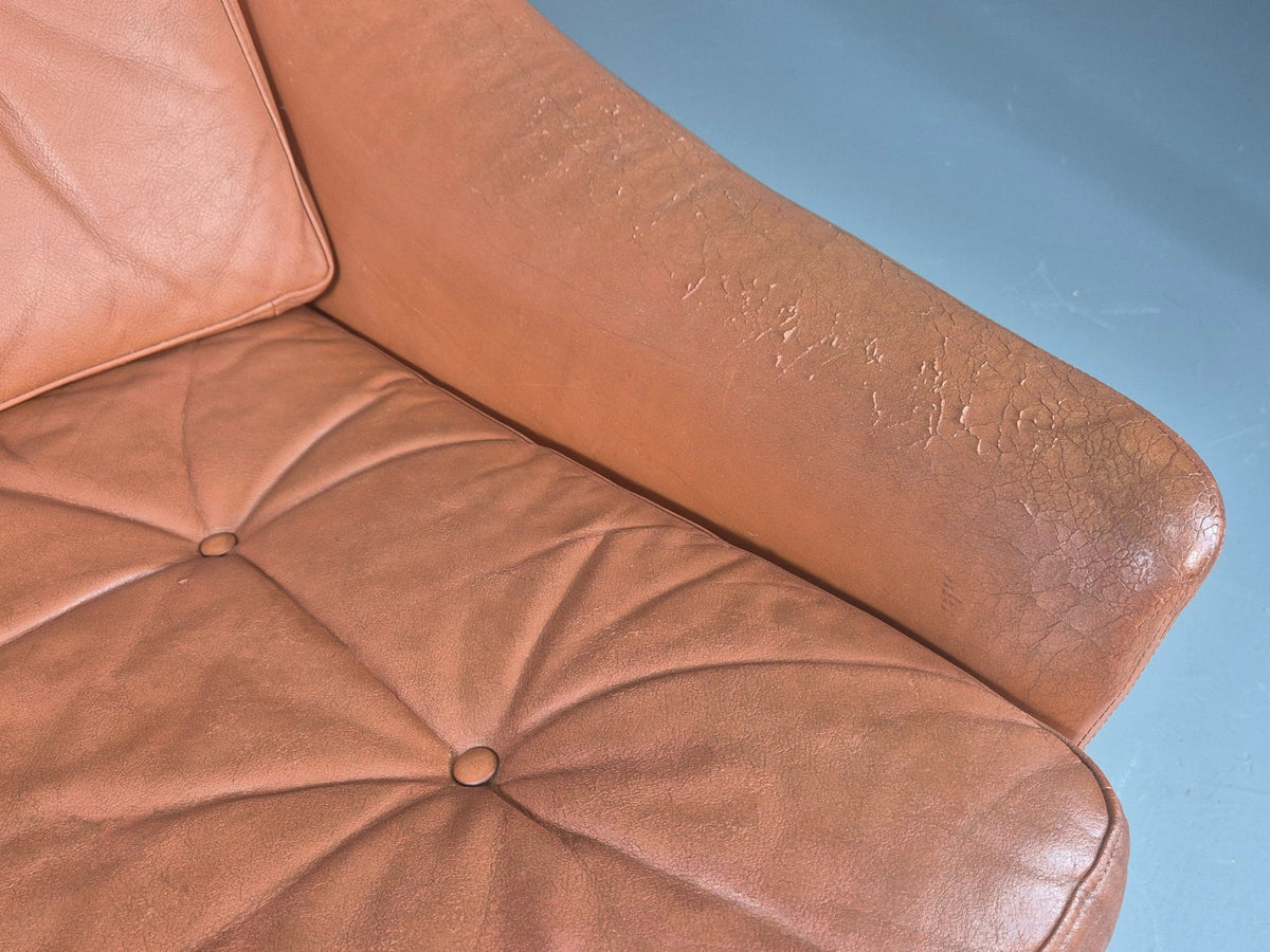 Tan leather sofa rear view frame
