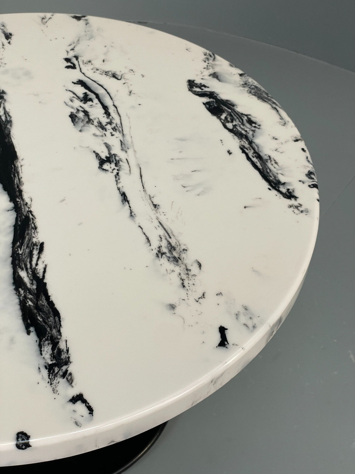 Faux marble side table side profile view