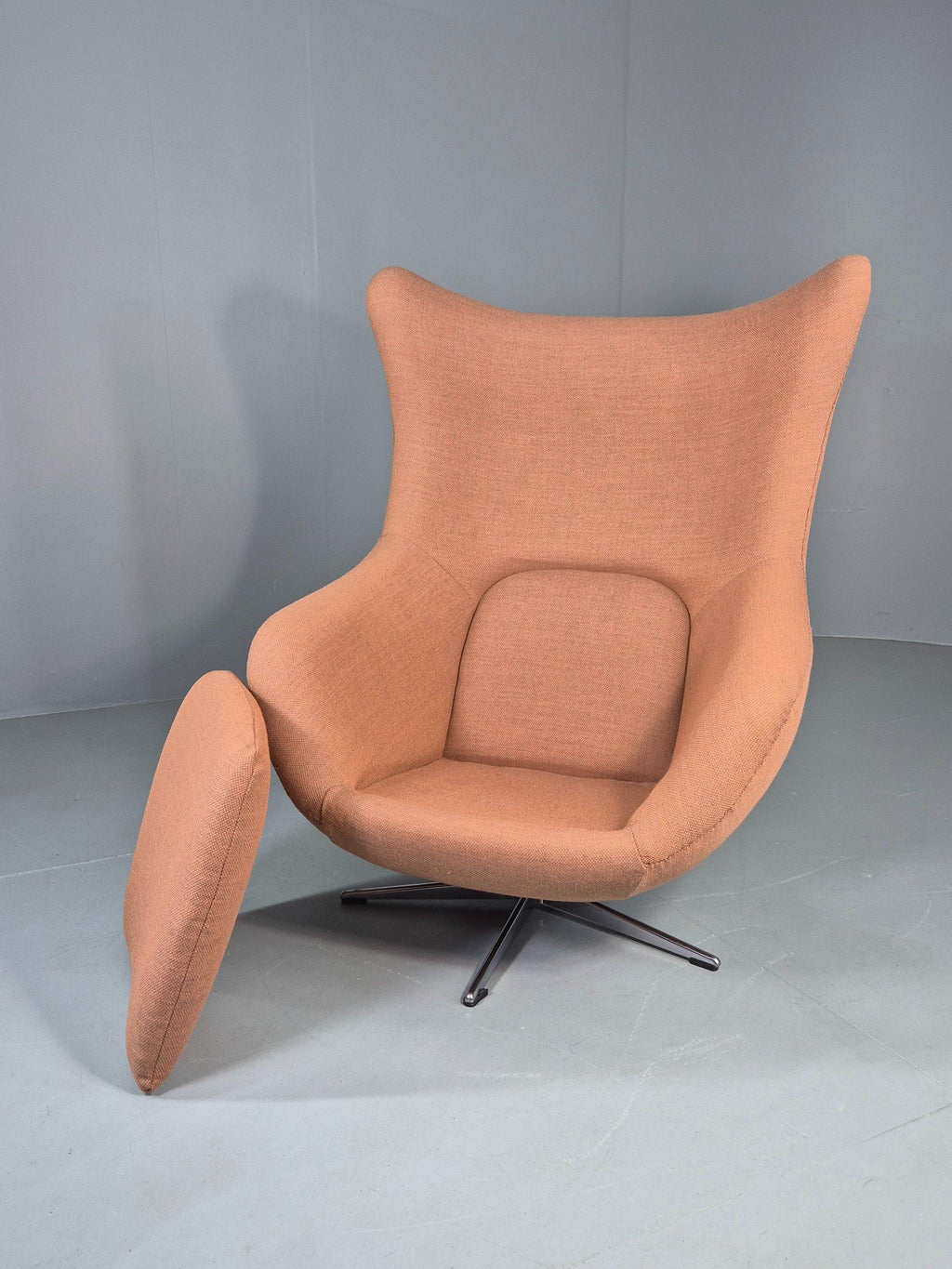 Egg chair brick red fabric close-up even coverage