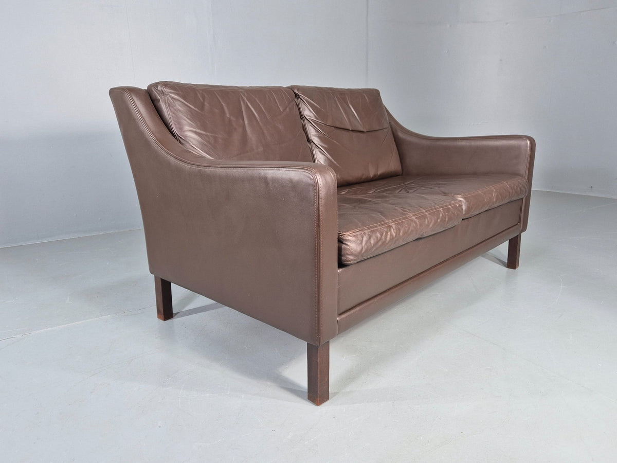 Brown leather sofa rear view