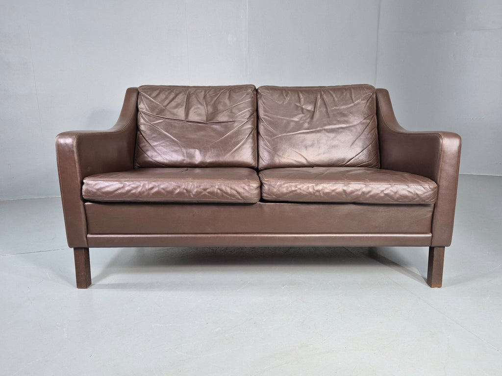 Brown leather sofa natural patina close-up