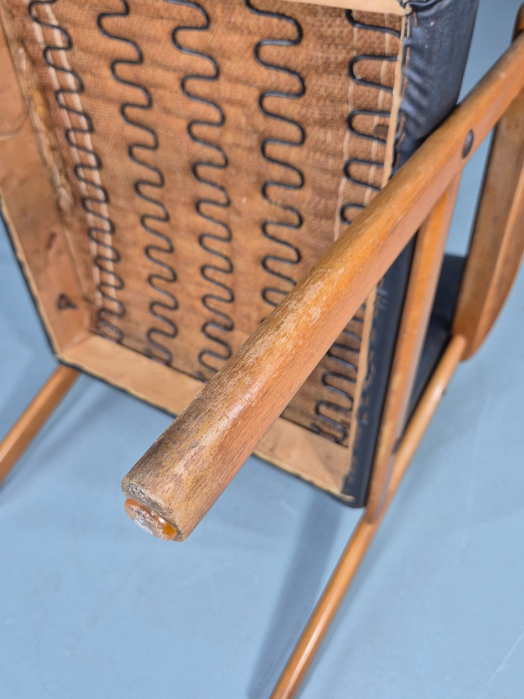 Teak lounge chair angled front view