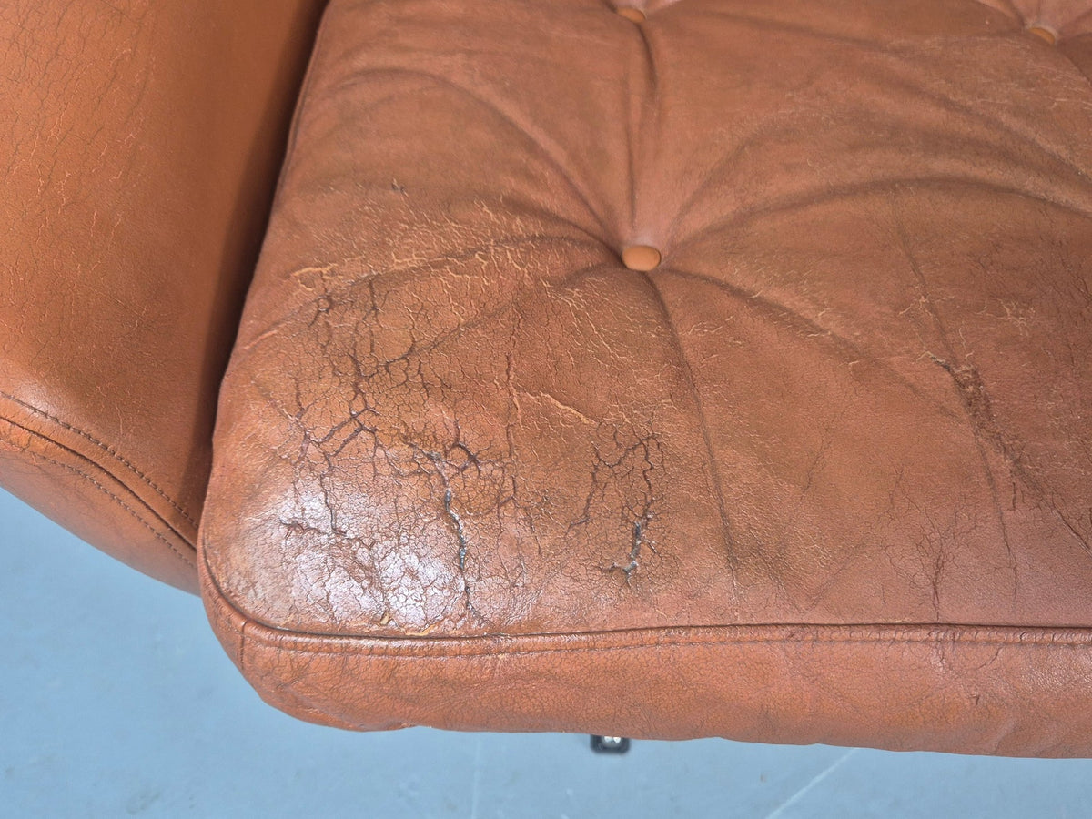 Tan leather sofa side profile view