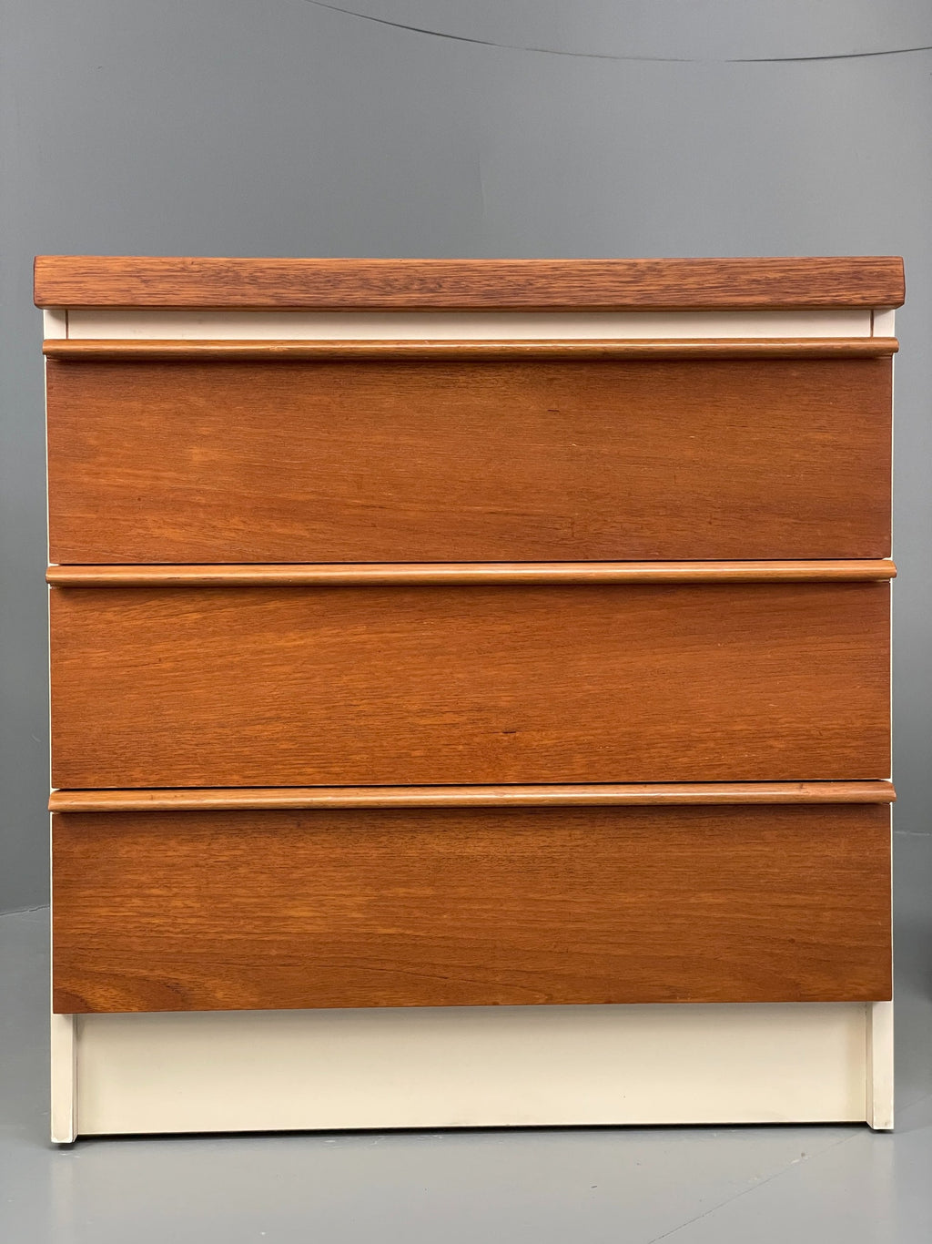 Teak bedside cabinet side profile view