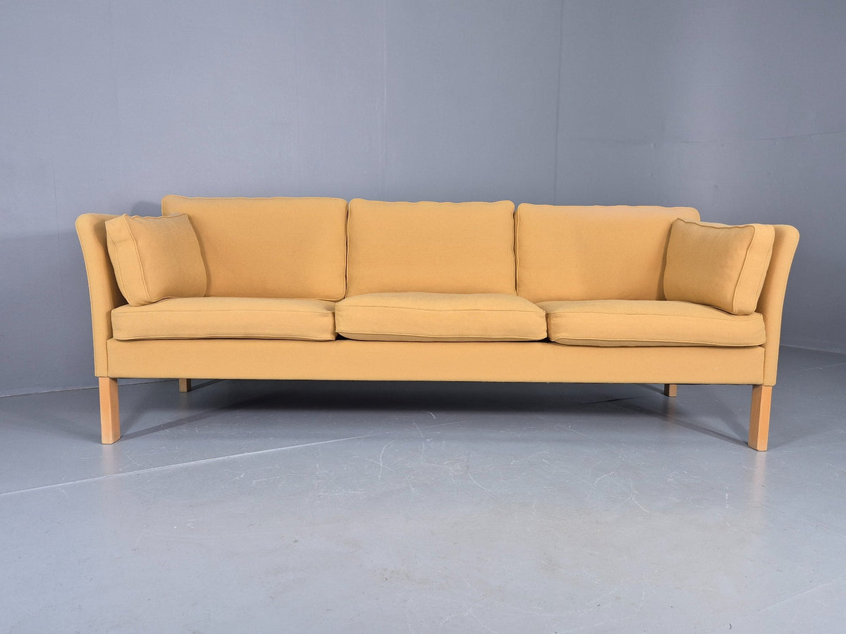 Yellow wool sofa beech frame leg detail