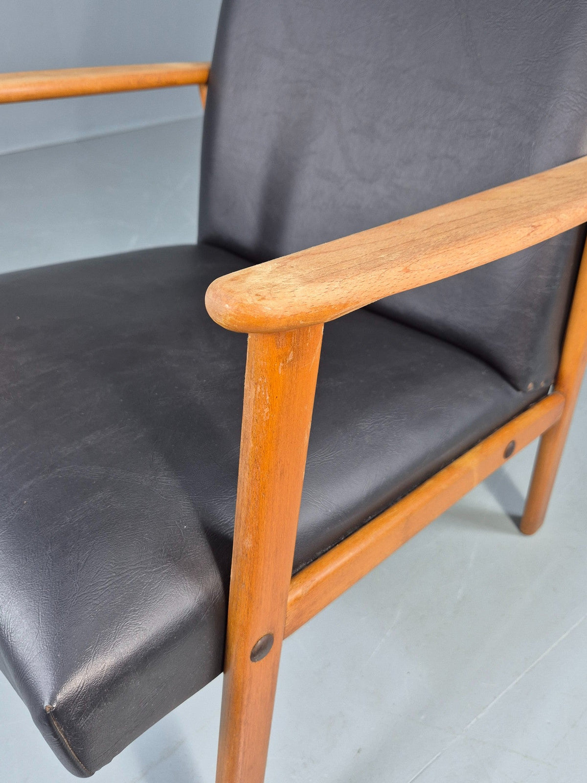 Teak lounge chair room context view