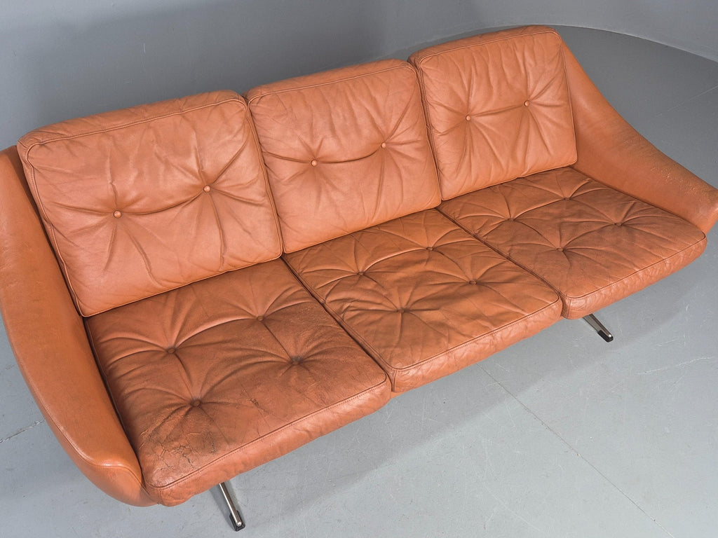 Tan leather sofa natural patina close-up