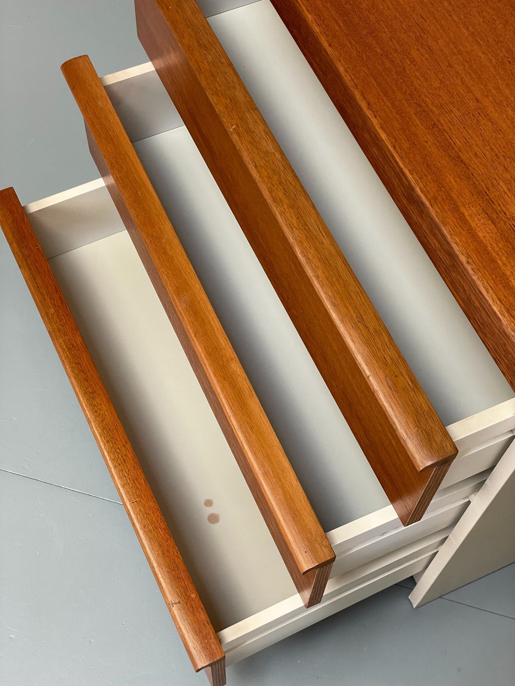 Teak bedside cabinet top surface grain
