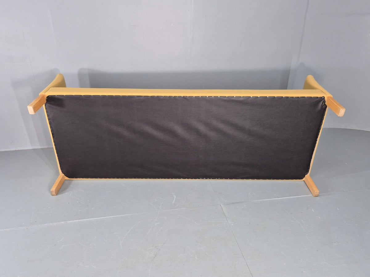 Yellow wool sofa side profile view