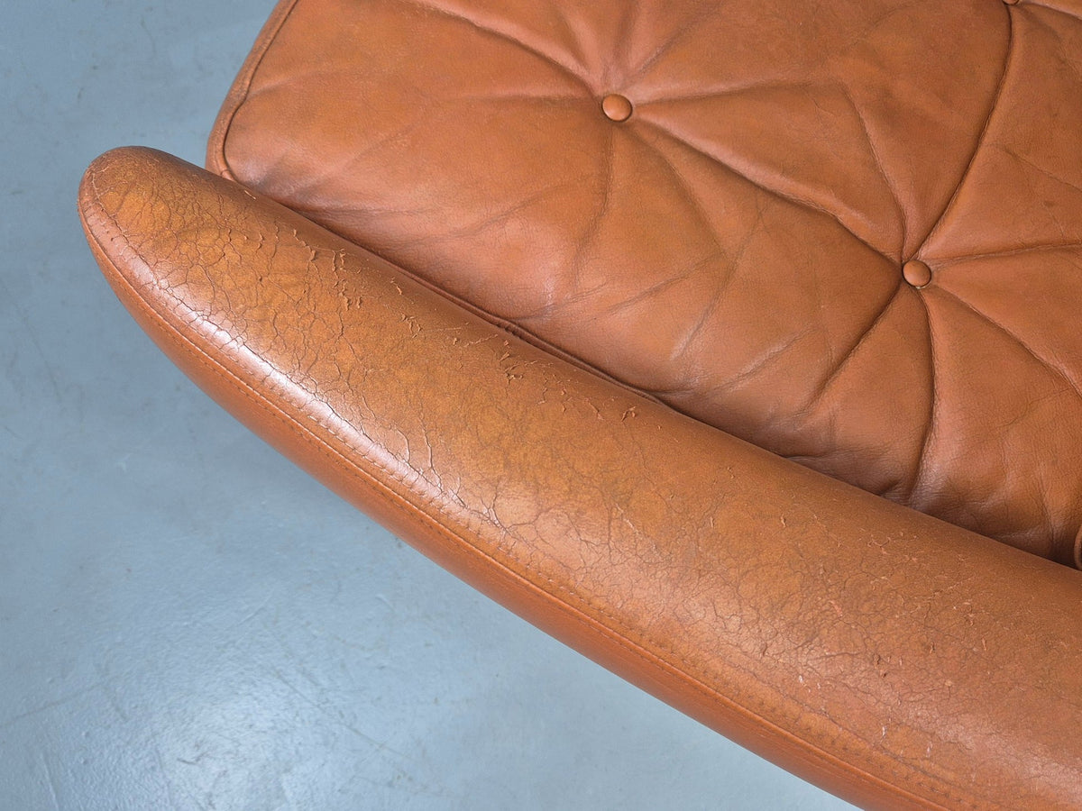 Tan leather sofa angled view