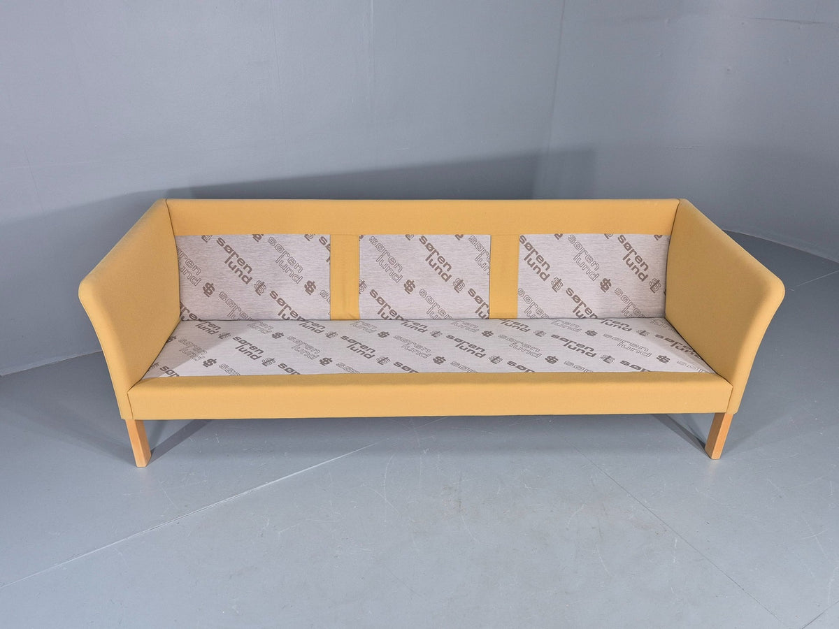 Yellow wool sofa arm detail